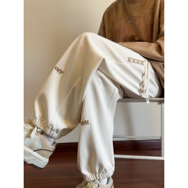 Men's Casual Joggers with Embroidered Design - Comfy Drawstring Sweatpants for Spring & Fall, Versatile Loose Fit